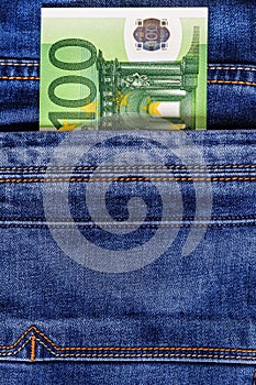 Euro bills in the pocket of jeans