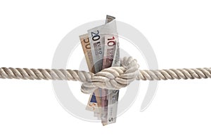 Euro bills tied with rope photo