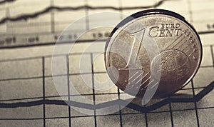 1 euro cent on newspaper