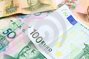 Euro and Chinese Yuan banknotes