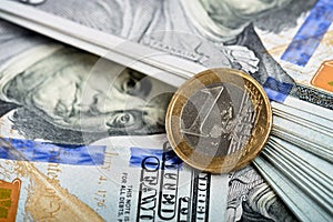 Euro coin and dollar notes