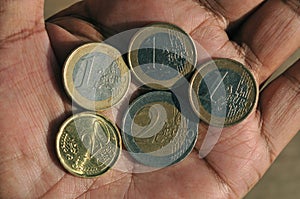 Euro coin on hand plame in Copenhagen Denmark
