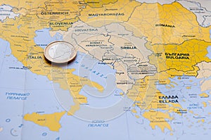 Euro coin on Mediterranean County map.