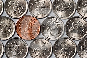 Euro coin among russian coins