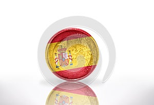 euro coin with spanish flag on the white