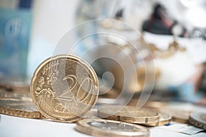 Euro coins and bank notes with golden pig background