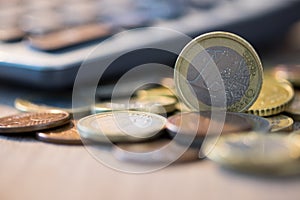 Euro coins with calculator, Money concept, close up euro coins