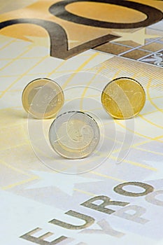Euro-coins on Euro-banknote