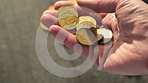 Euro coins in hand.Lack of money.Salaries and benefits in the European Union