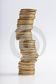 Euro coins tower in balance