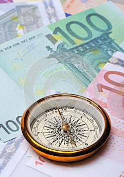 Euro and compass