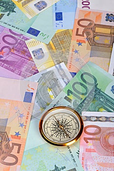 Euro and compass