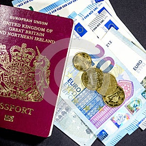 Euro Currency Bank Notes and Coins With a British Passport