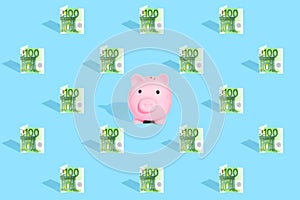 . Euro currency banknotes pattern and pink piggy bank on bright blue background. The concept of financial savings and different