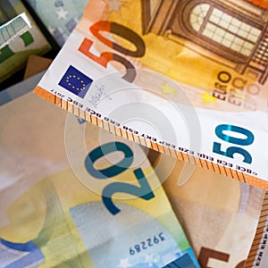 Euro Currency Focus. A close-up of 20 and 50 notes, highlighting the currencyâ€™s design and colors