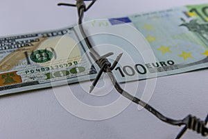 Euro Dollar Conflicts, banknote Dollar and banknote Euro, Euro vs Dollar with barbed wire, Economic crisis