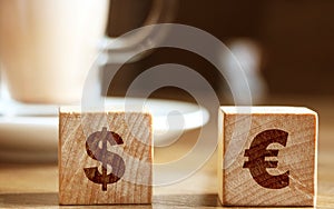 Euro and dollar on wooden blocks sign concept. EU word currency business concept