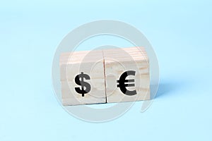 Euro and dollar on wooden blocks sign concept. EU word currency business concept