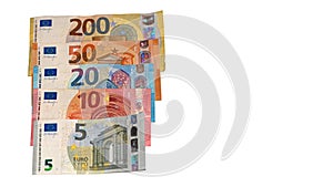 Euro (EU) banknotes in a row, official currency of Europe with white background for copy space