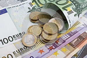 Euro (EUR) notes and coins. Business concept.