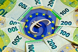 Euro exchange rate. euro bills and the sign on the flag of the European Union.Depreciation of the euro currency.European