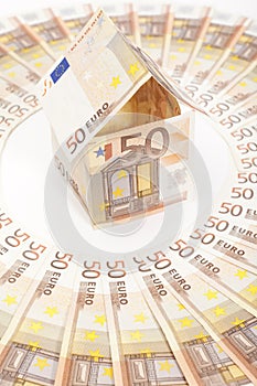 Euro house and banknotes