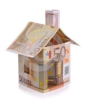 Euro house made from banknotes isolated