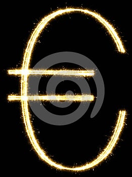 Euro made of sparkler. Isolated on a black background.