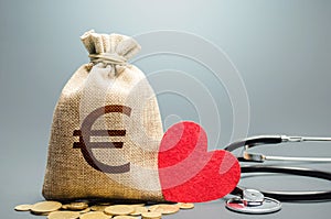 Euro money bag and stethoscope. Health life insurance and financing concept. Subsidies, investments. Funding healthcare system. photo