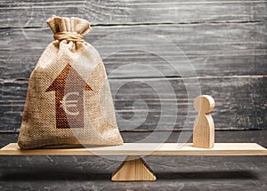 Euro money bag with up arrow and man figurine on scales. The average salary in the labor market, pricing. Criteria photo