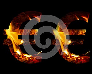 Euro money business symbol made from fire and burning wood on a black background, a double version of the alphabet for decorative