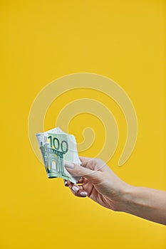 Euro Money Cash background. Female hands holding euro banknotes