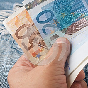 Euro money in hand