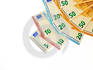 Euro money is papered on a white background.