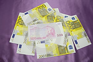 200, 500 Euro notes background texture - mingled pile