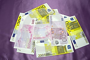 200, 500 Euro notes background texture - mingled pile