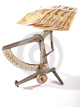 Euro notes on a scale