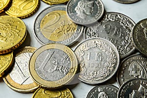 Euro and Swiss francs cents and coins
