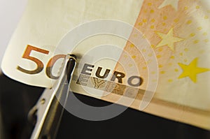 Euro under magnifying glass