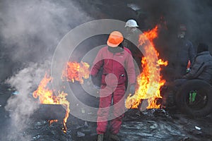 Euromaidan protester on the barricades in the center of Kyiv photo