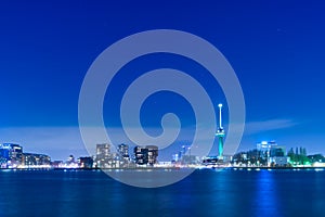 Euromast tower and night skyline in new Maas River, Rotterdam, Netherlands