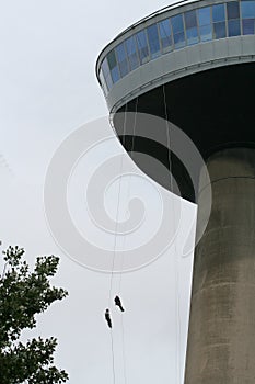 Euromast, various persons do abseil from the highest tower of Rotterdam