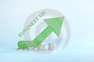 Euronext 100 index in green upward arrow with increasing stack of coins. Bullish run in Europe European stock market. photo