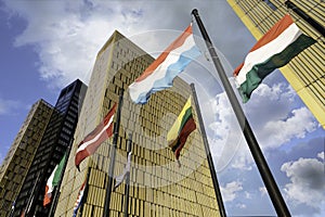 Europe flags flapping in the wind in front of european court of justice