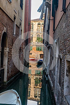 Europe, Italy, Venice, Italy, VIEW OF CANAL AMIDST BUILDINGS IN CITY