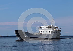 Europe. Mediterranean area. Adriatic sea. Croatia. Dalmatian seascape. Big ferry floating in sanny day. Maritime transport in Croa