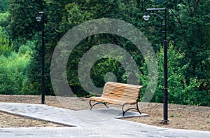 Europe, Russia.City landscape in summer, bench in the city park