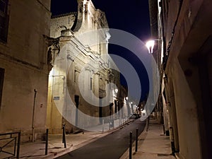 Europe. south of France. Provence. Vaucluse. Avignon. Illiminated church on the night street in downtown. photo