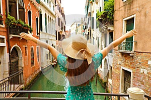 Europe travel vacation fun summer woman with arms up and hat hap