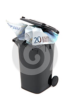 European bank notes in black rubbish bin